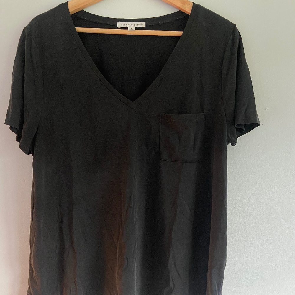 Black short sleeve v-neck shirt with front pocket